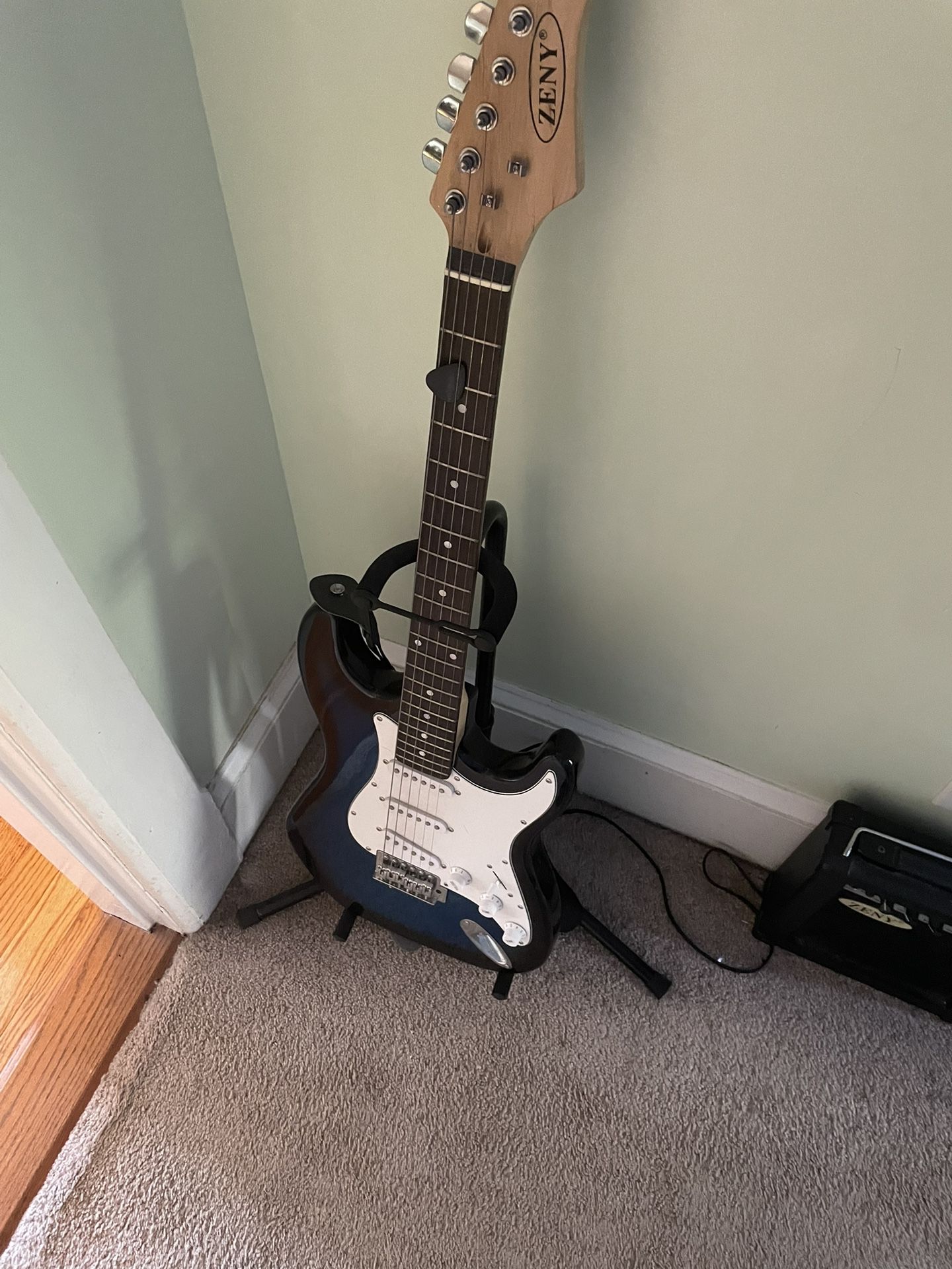 Zeny Guitar 39” With Bag, Stand, And Amp