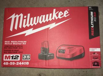 Milwaukee Battery, Charger And Bag