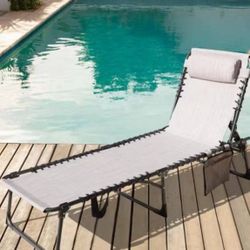 VEIKOUS Outdoor Folding Chaise Lounge Chair Fully Flat for Beach with Pillow and Side Pocket $39