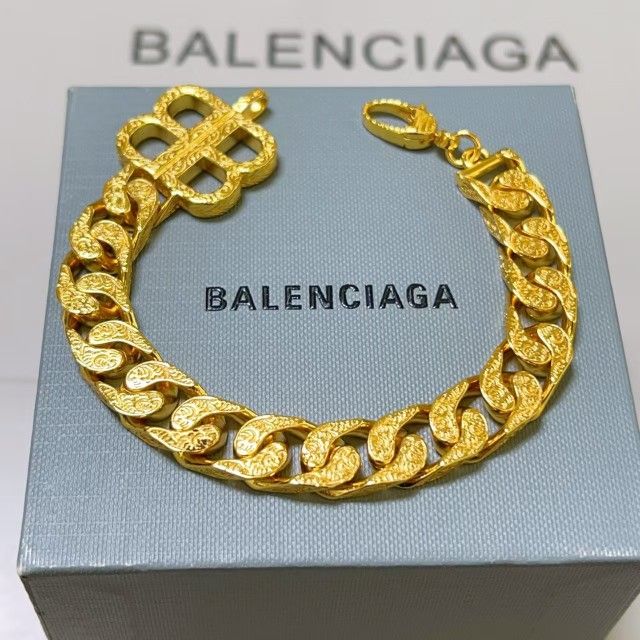 Balenciaga golden bracelet;