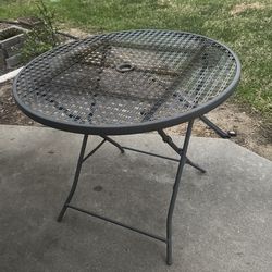Free fold-up metal patio table