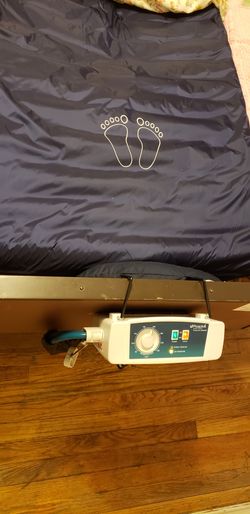 Medical bed wity adjustable air mattress