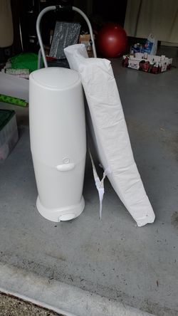 Diaper genie and changing pad