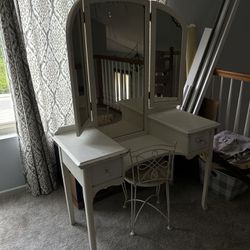 antique vanity table and bed frame