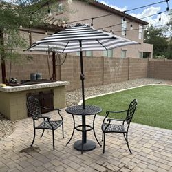 Bistro Patio Table, 2 Chairs and Umbrella.