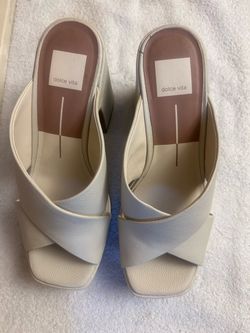 Dolce Vita women's cream heeled sandals with crossed vamp straps