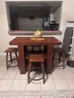 Rustic Wood Pub Table with 4 Barrel Stools