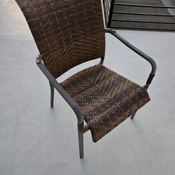 Set of four outdoor wicker stackable chairs