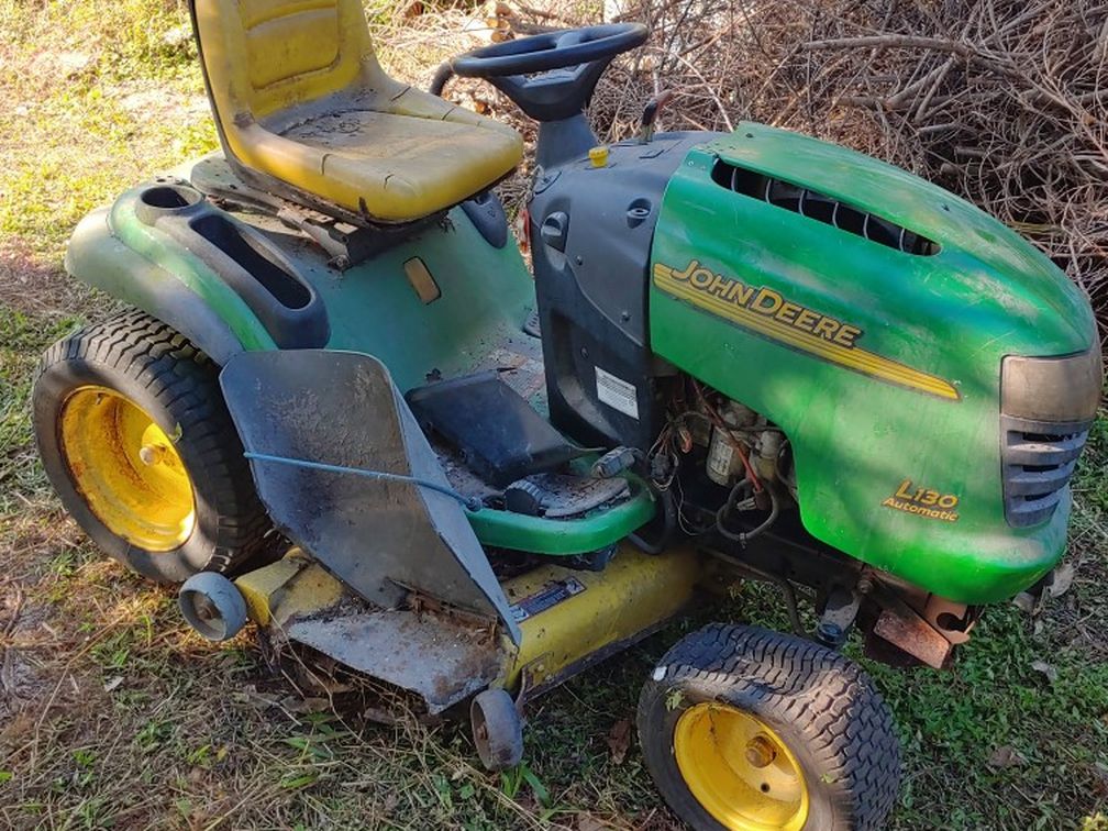 John Deere L130 Lawn tractor 48″ mid-mount mower deck. Riding Lawn Mower (NOT FREE)