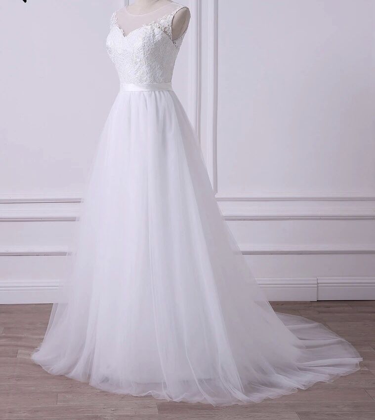 Wedding dresses. Miledy Bridal Boutique