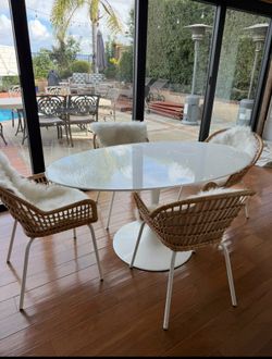 White Oval Table & Wicker chairs