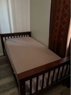 Dark brown twin size bed frame