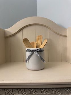 White Ceramic Utensil Holder with Wooden Spoons