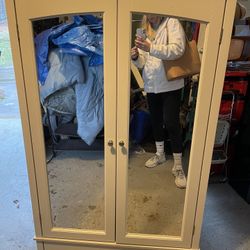 Mirrored Armoire With Shelves And Drawer 