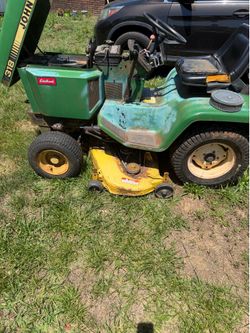 John deer   Needs help.    Water in the gas due to bad cap. Mechanic special
