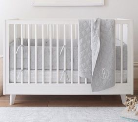 Used pottery barn crib top