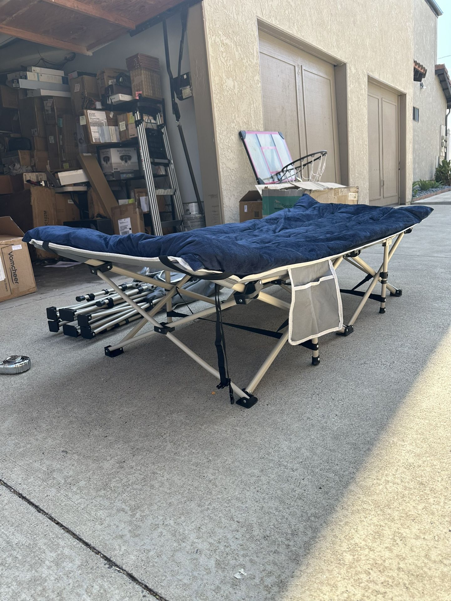 New condition extra wide folding cot with soft mattress pad