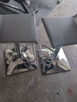 Silver swivel chairs