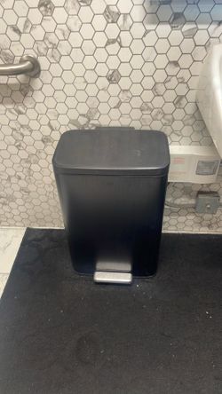 Black trash can