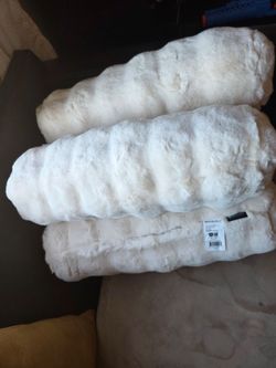 White decoration pillows. Half body size