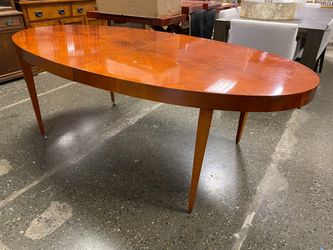 Tiger Maple Finish Oval Dining Table