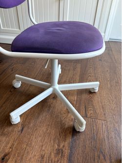 Black office chair.  Swivels and adjusts.