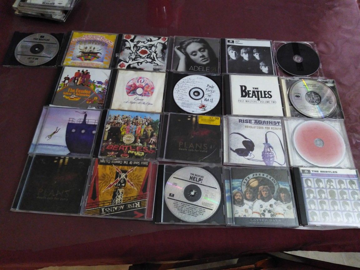 21 CDs selling all mostly Beatles
