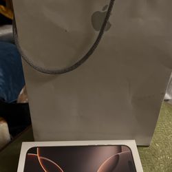 Empty iPhone 15 box and bag