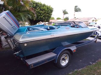 18ft baja speedboat 235hp evinrude trailer