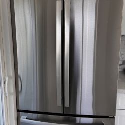 Brand new GE 21.9 cu. ft. Counter-Depth French Door Refrigerator purchased from Home Depot — wrong size for our kitchen, never used. 