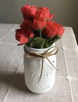 Distressed mason jar vase with silk flowers included!