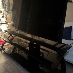 Flat-Screen TV With Modern Glass & Metal Stand