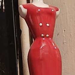 SET OF THREE LADY FIGURINES