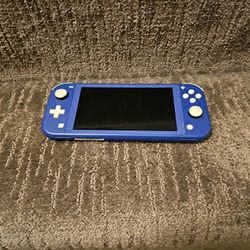 Nintendo Switch Lite And 4 Games