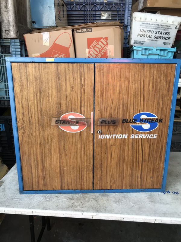 Vintage standard plus blue streak ignition service metal wall
