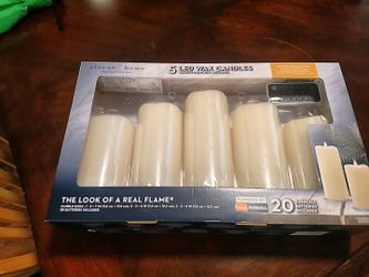 5 led wax candles new in box, including 20 Duracell batteries!