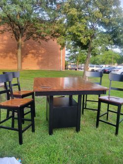 High top table with 4 chairs