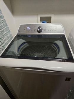 White GE Profile Washer and GE Profile Gas Dryer