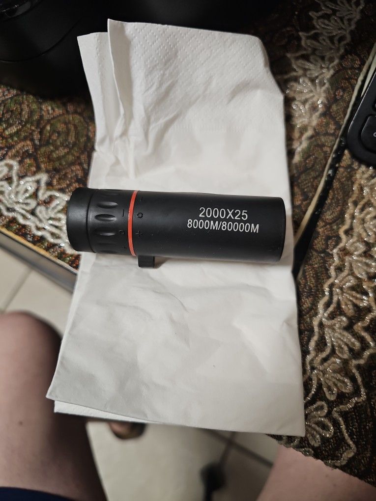 Small hand held Binocular 2000x25 8000M/80000M. Great for sport or bird watching.