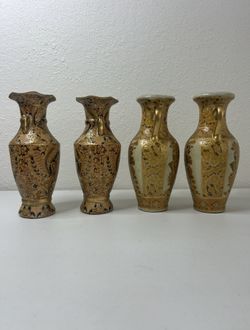 Set of 4 decorative vases.