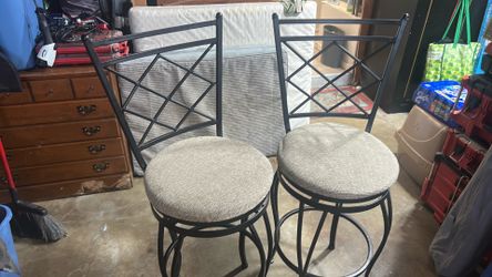 Wrought  iron  padded seats  bar stools  2 of them