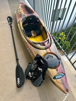 Pelican Kayak with Paddle & Life Vest