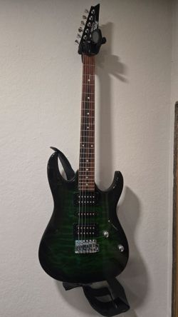 Green Electric Guitar w/ amp and carrying case