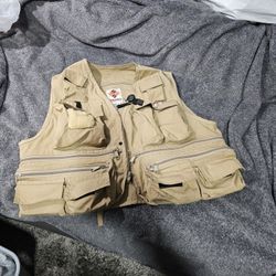 Nice Fly Fishing Vest, All Sorts of Weights, Hooks Etc Included, Lots Of Pockets