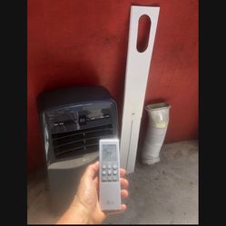 Like New LG Portable Air Conditionerm 12000 BTU looks New Tested Works Perfectly when you come ill fully test it for you 