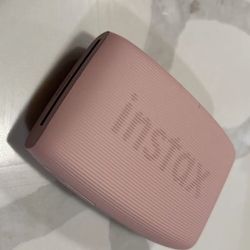 Pink fujifilm instax polaroid printer