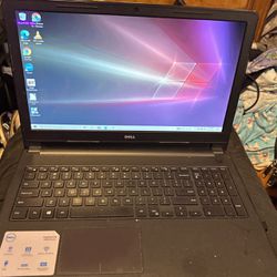 Dell Laptop With An Extra Wireless Mouse And Keyboard 