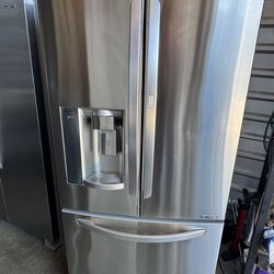 LG refrigerator french 3 door  stainless 24 cu.ft with water and ice dispenser dimensions 69 7/8 height 33 width 33 depth