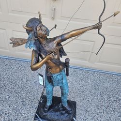 Bronze statue of Indian With bow and arrow on marble base 