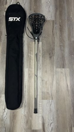 lacrosse stick and bag